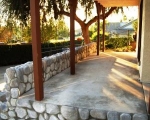 concrete-patio-with-river-rock-veener_after